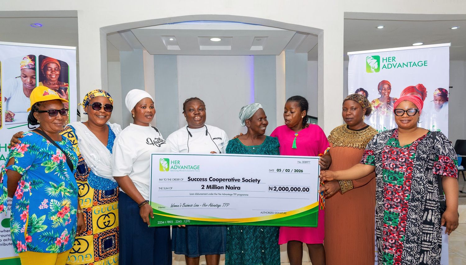 Cooperative members receiving their enterprise capital cheques